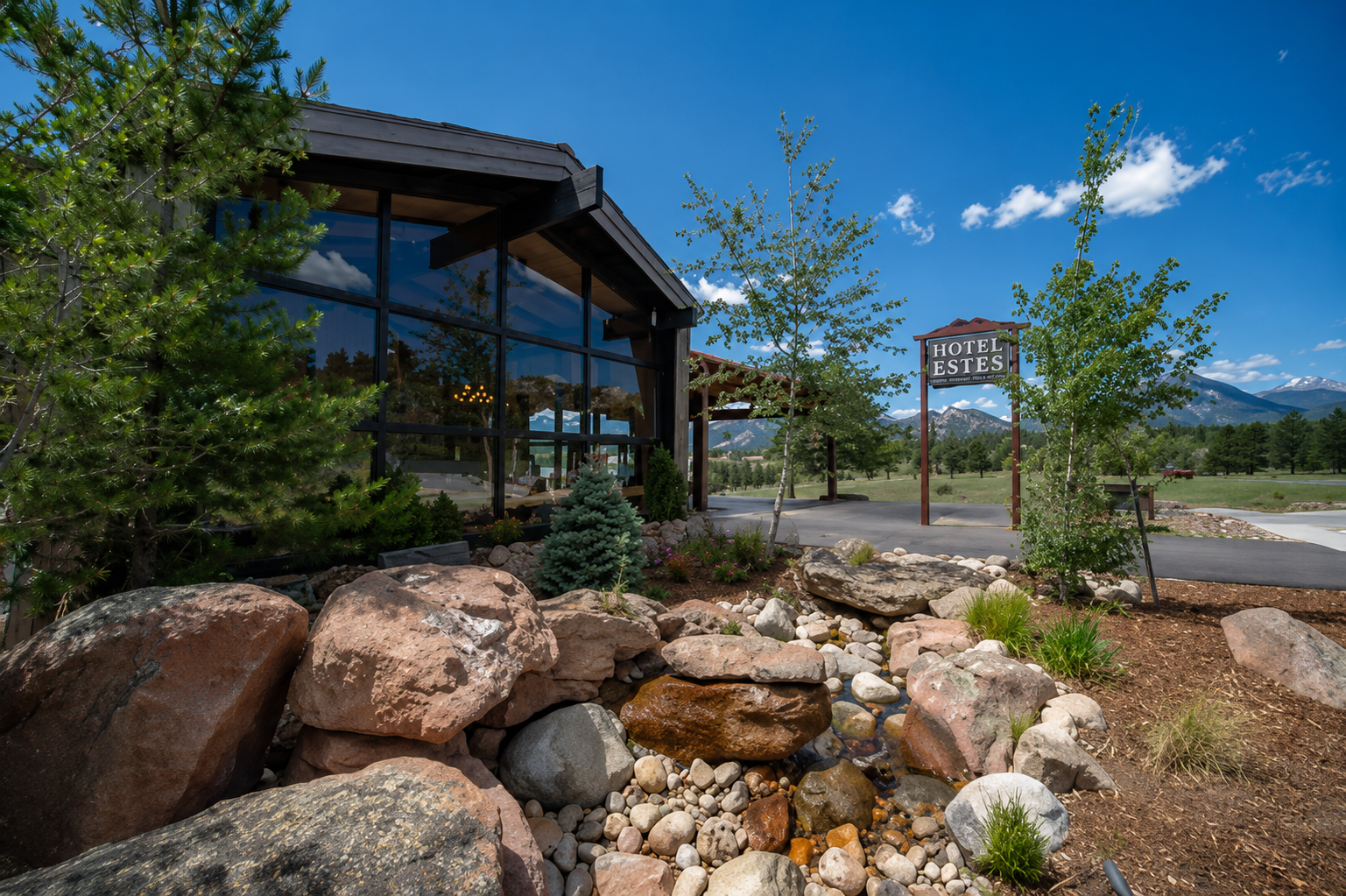 Hotel Estes buildings with Rocky Mountain scenery